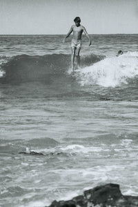 A young Wayne Lynch nose-rides at Lorne Point